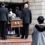 Sudden Death Scrambles Trump’s Majority Pallbearers carry a casket into a stone church