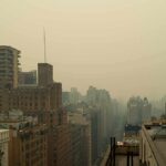 City skyline shrouded in heavy haze