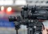 Officer Shatters Window—Heat Rising Fast Professional video cameras on tripods