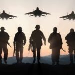 Chants Erupt As Air Force One Screams Over Soldiers walking with fighter jets flying overhead at sunset