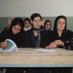Campus Harassment Ruling Muzzles Editors Sihem Habchi and other women seated at a classroom desk