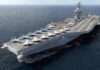 Navy Pilots Face An Unanswered Health Question Aircraft carrier at sea with fighter jets on deck