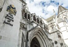 Epstein-Linked Investigation Faces New Court Fight Royal Courts of Justice exterior with Gothic arches