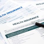 Broker Scam? 760,000 Vanish From Obamacare Close-up of health insurance application forms with a pen