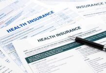 Broker Scam? 760,000 Vanish From Obamacare Close-up of health insurance application forms with a pen
