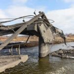 Mountain Wave Obliterates Nepal Villages Collapsed concrete bridge over a river