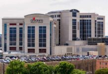 Texas Hospital Pays $10M, Opens Controversial Clinic children's medical center hospital exterior with parking lot