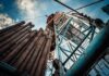 Gas Spike Torpedoes Prices Before Midterms Oil drilling rig structure with stacked pipes viewed from below