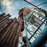 Gas Spike Torpedoes Prices Before Midterms Oil drilling rig structure with stacked pipes viewed from below