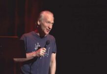 Behind Closed Doors: Maher’s Trump Curveball Bill Maher performing stand-up with a microphone on stage